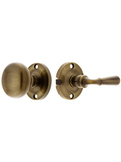Solid Brass Rosette Storm Door Latch Set In Antique Brass.